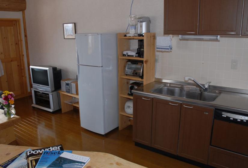 2nd floor kitchen with refrigerator shelf and sink