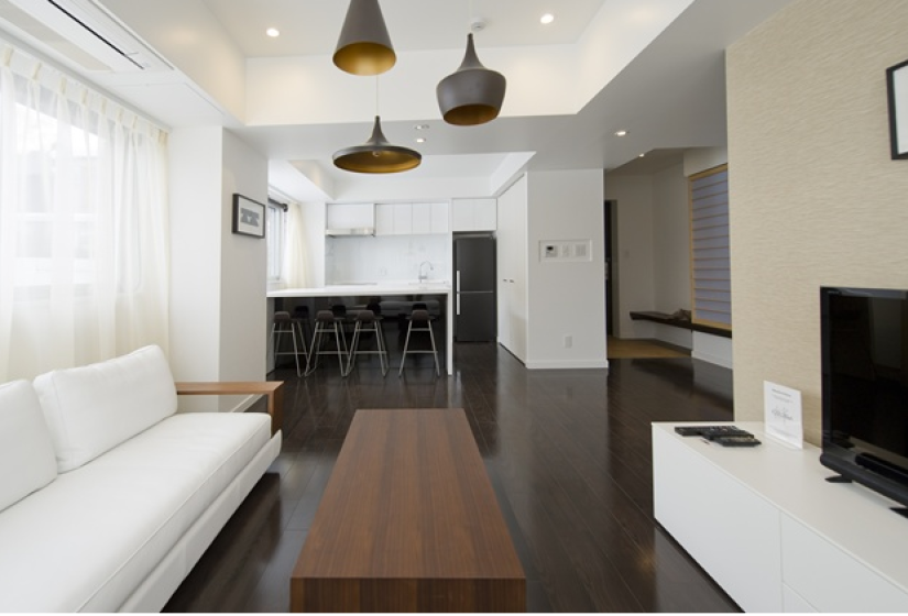 living area with long coffee table 