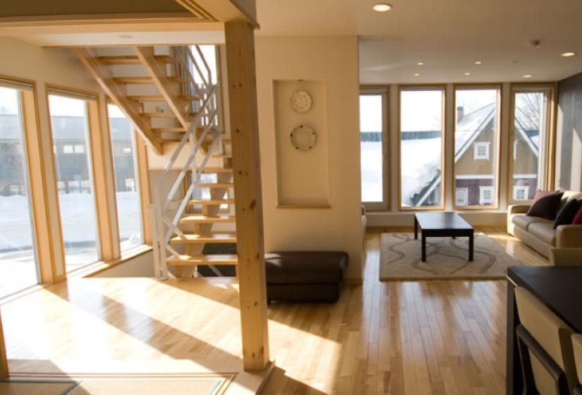 large windows light up the townhouses during the day