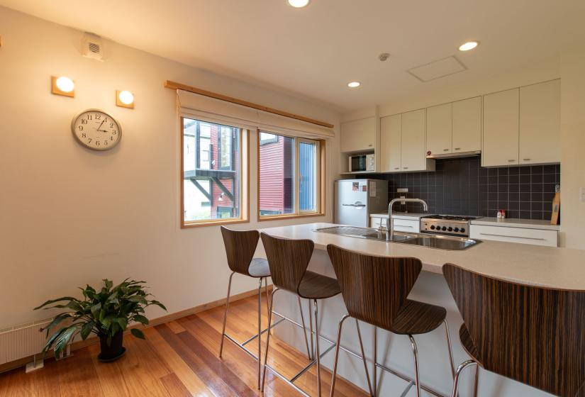 bar stools at white breakfast counter