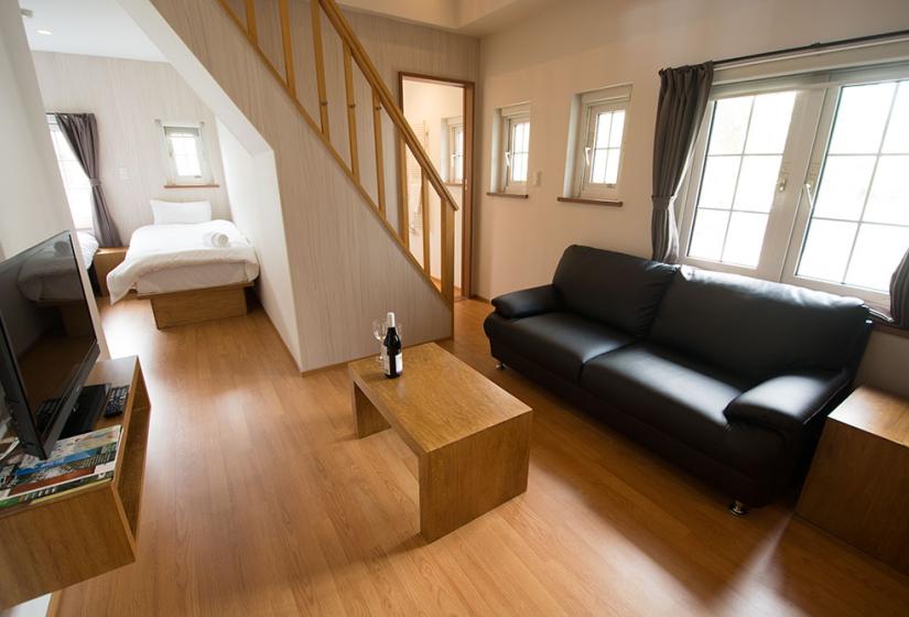 TV lounge area with twin bed alcove in Snowbird