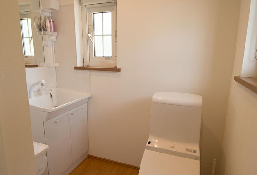 toilet and vanity in a Snowbird apartment