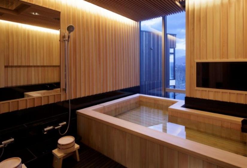 large hinoki bath and Japanese style wash area