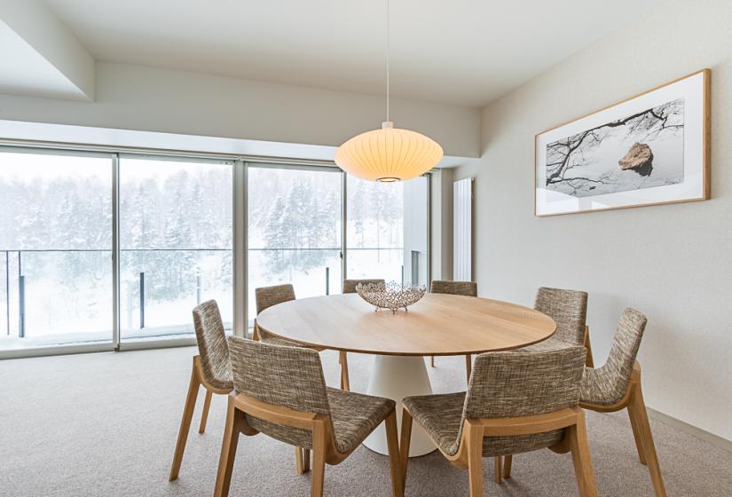 Round dining table with hanging light