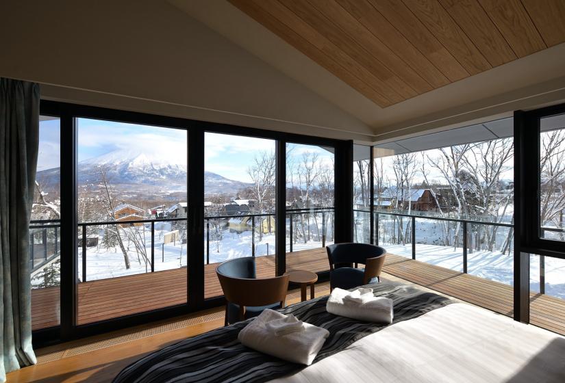 Lounge area with two chairs in front of window