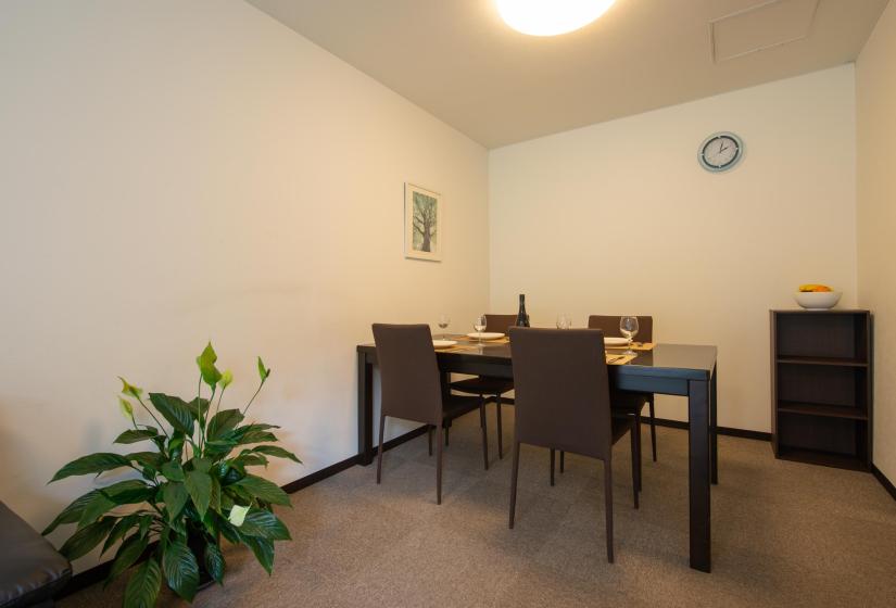 Dining room with table and house plant