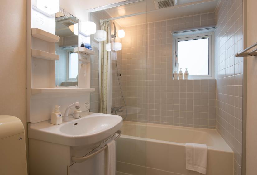 grey tiled bathroom and vanity