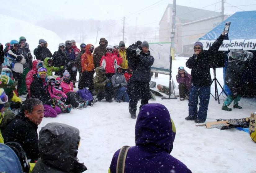 A charity auction takes place in the snow
