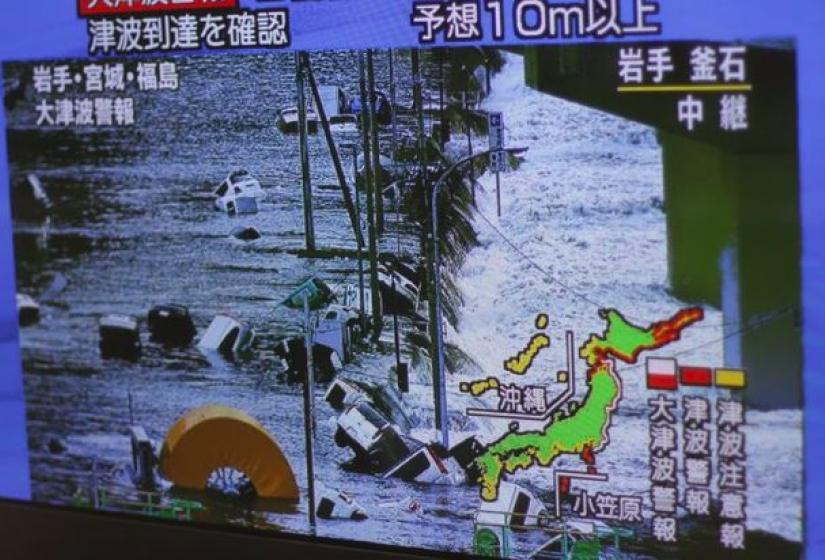 A tsunami scene on television 