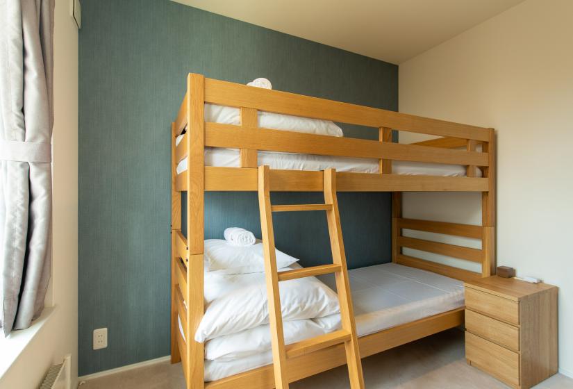 Bunk beds with white duvets