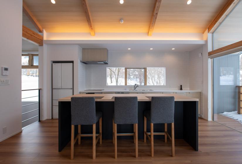 3 chairs against a breakfast bar