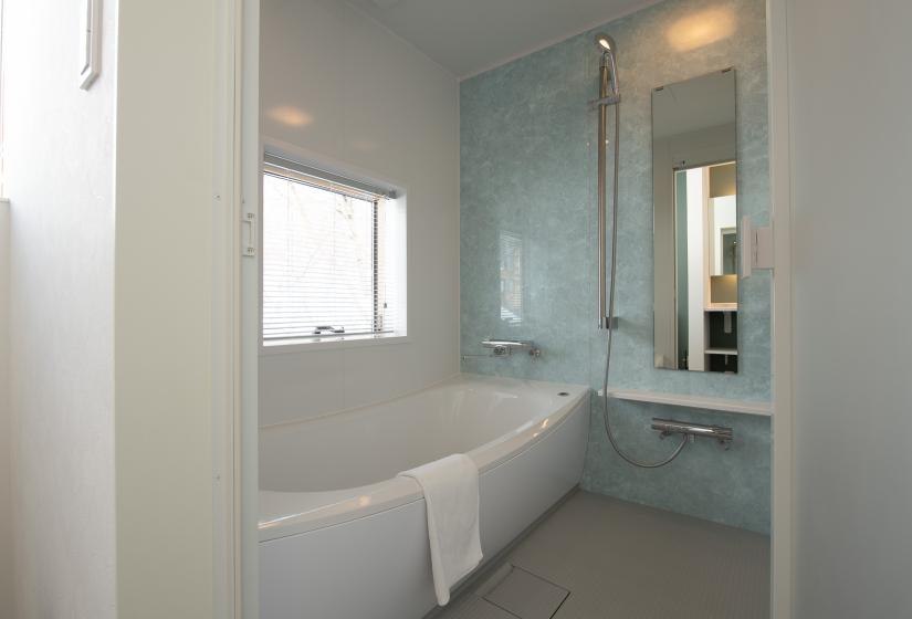 A bathtub and shower unit.