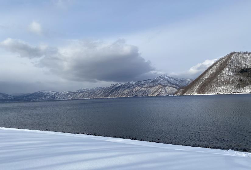 A lake with snowy shores 