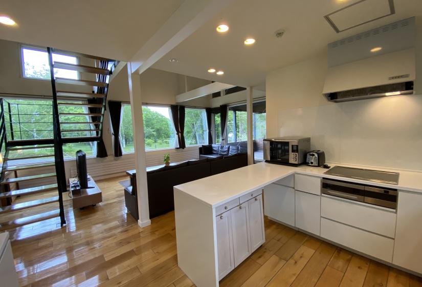 A white kitchen beck and stove top