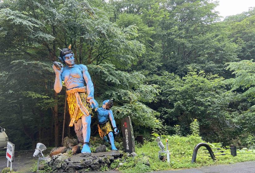 Father and som Oni or demon at the west entrance to Noboribetsu