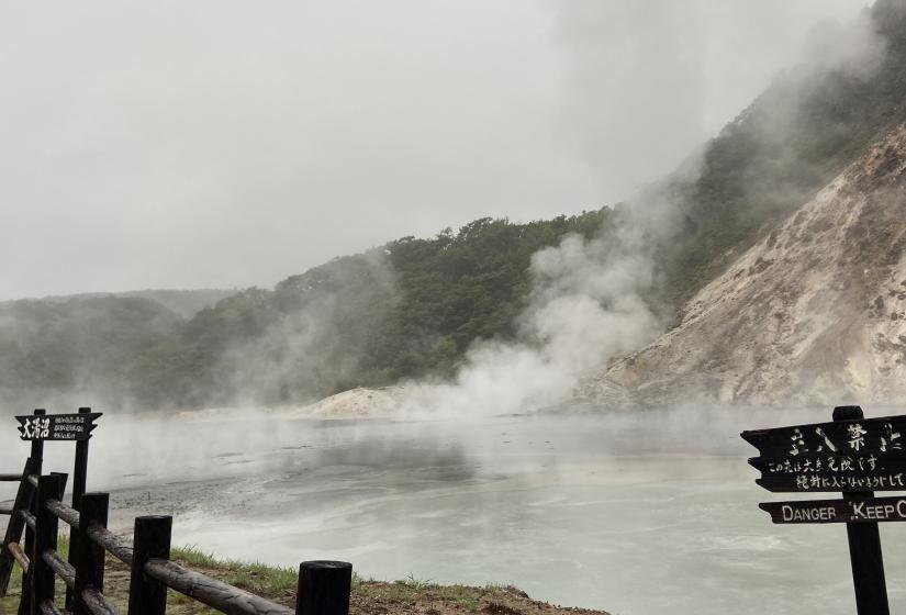 Lake Oyunma steaming and gurgling on wet morning