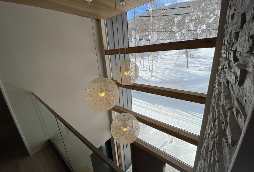 3 hanging light and window behind
