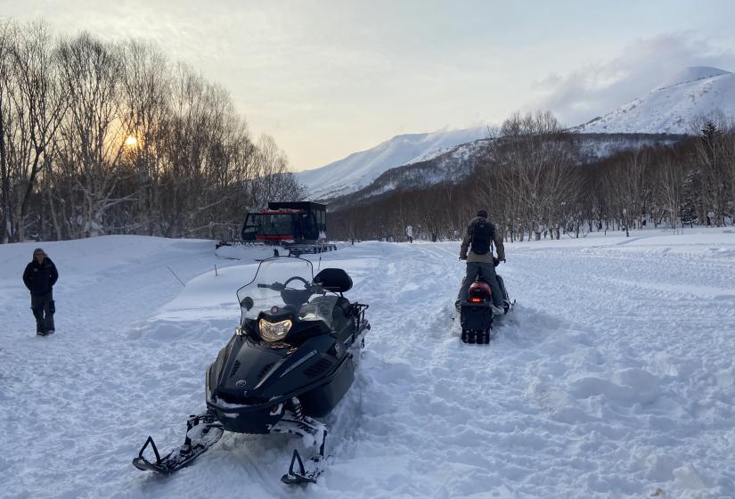 From sunrise to sunset the Shimamaki Snow Cats experience was an incredible one. A snowmobile and snow cat at sunset.