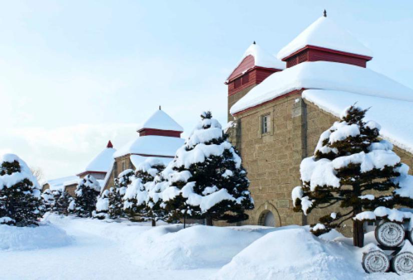 Even the Nikka factory sits under a foot of fresh! Historic brick buildings smothered in snow