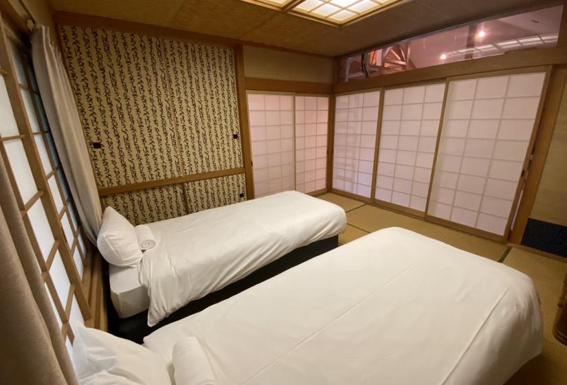 Tow single beds with Shoji doors