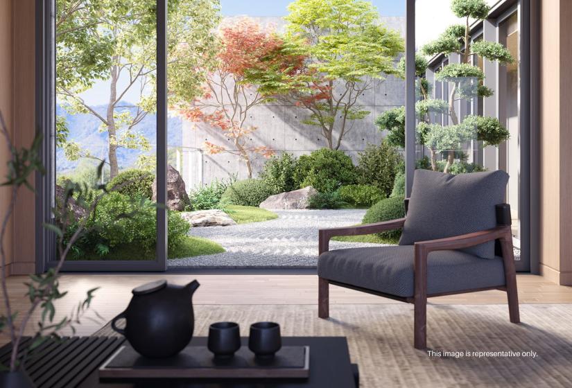 A computer generated image of a chair and tea set with garden view behind.