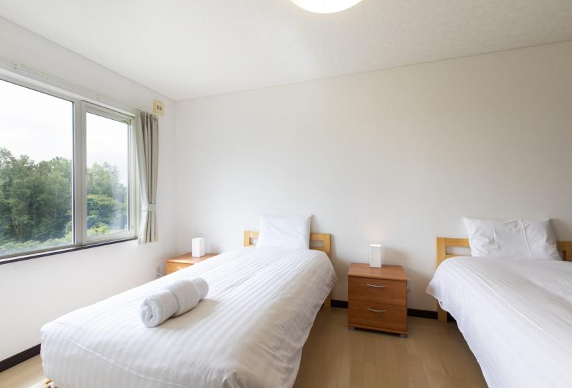 Yotei Chalet bedroom with two beds
