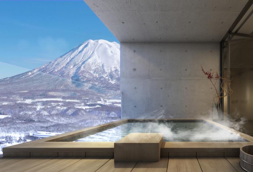 An outdoor onsen with Mount Yotei View