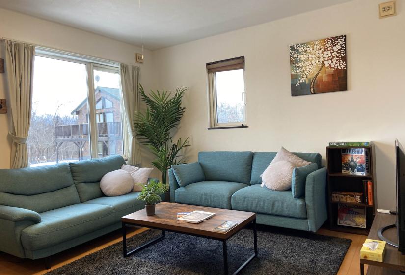 Two blue sofas and coffee table