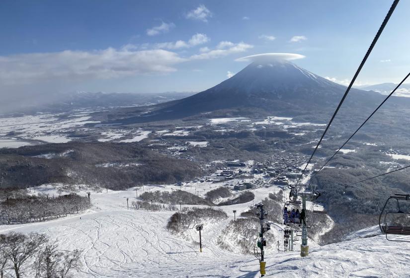 A view down center 4 chairlift with Mount Yotei behind