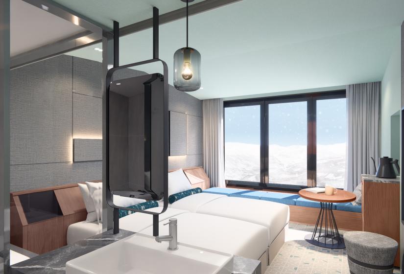 bathroom sink with bed behind