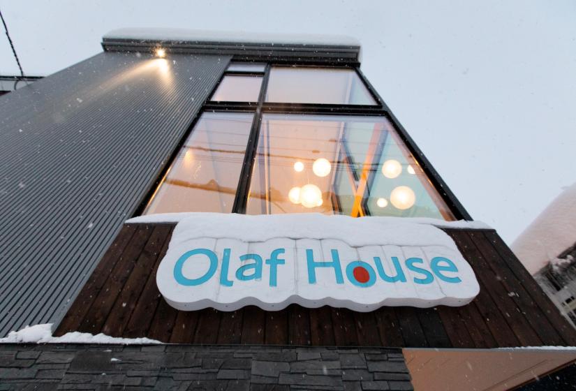 A building with Olaf House sign