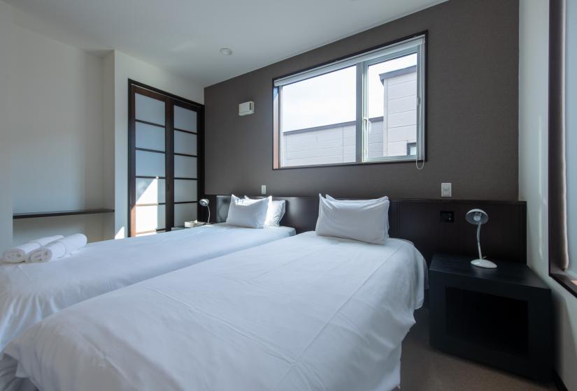 Two made single beds