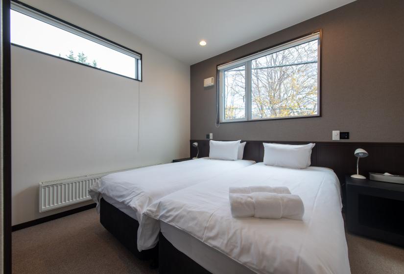 Two single beds in a room
