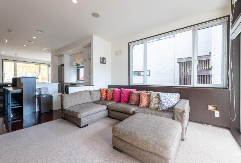 A lounge suite and large poof