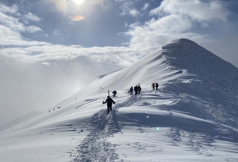 "Earning turns" on the way to the peak!