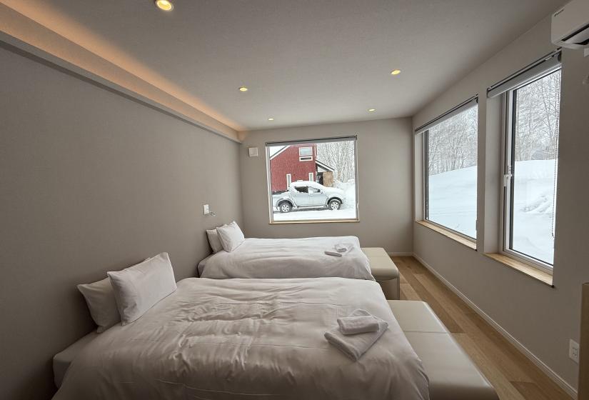Two made up single beds