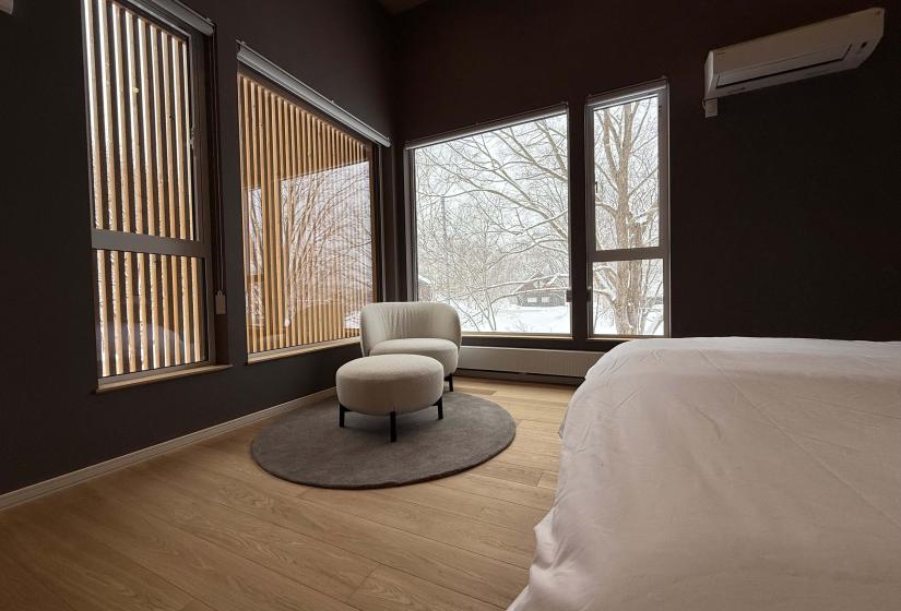A chair and window behind