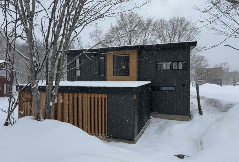 The exterior of a wooden and steel clad house