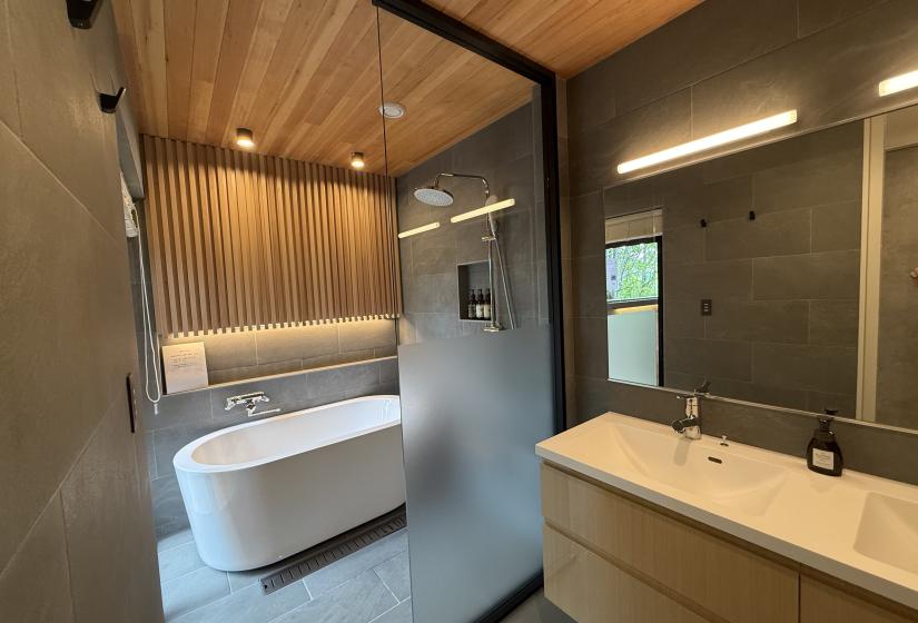 A bath and basin in bathroom