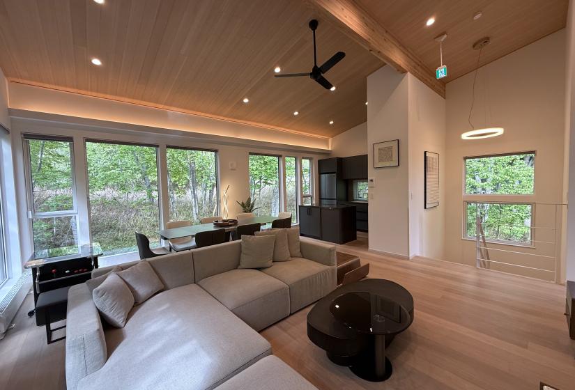 A lounge suite and table behind