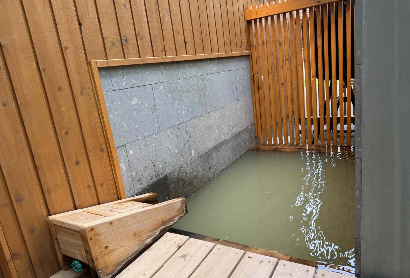 An onsen bath with milky water
