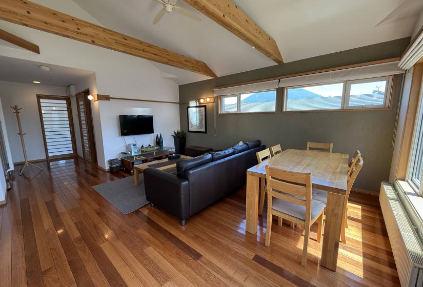A table, lounge and tv