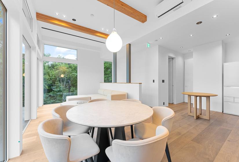 A dining table with hanging light