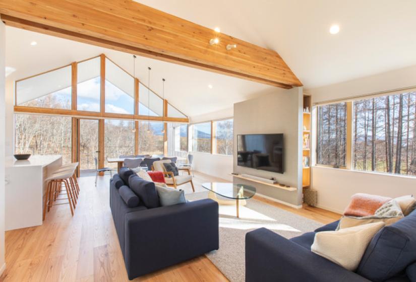 Two blue sofas in a large living room
