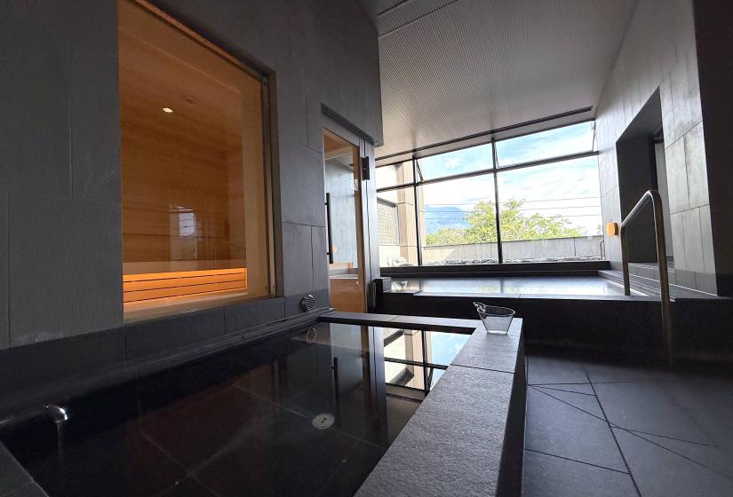 Two onsen baths with sauna to the left.