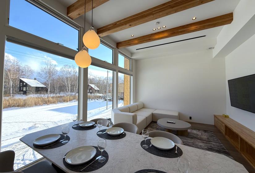 a set table and large window behind
