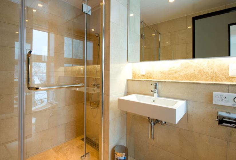 A shower and bathroom sink