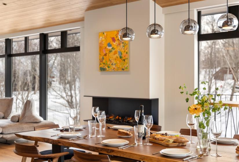 A set dining table and lights above