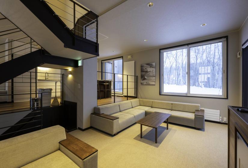 Longe area with stair way to the left.