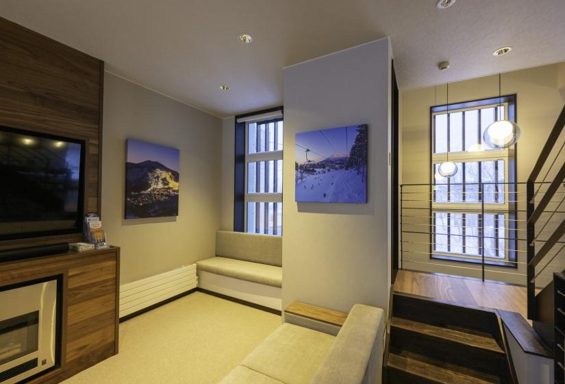 A lounge area with TV to the left.